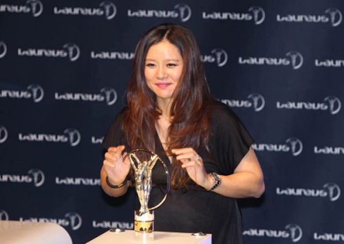 Latest honor: Retired tennis star Li Na is named winner of the Laureus Exceptional Achievement Award on Wednesday at the 2015 Laureus World Sports Awards in Shanghai. (Photo: GAO ERQIANG/China Daily) Latest honor: Retired tennis star Li Na is named winner of the Laureus Exceptional Achievement Award on Wednesday at the 2015 Laureus World Sports Awards in Shanghai. (Photo: GAO ERQIANG/China Daily)
