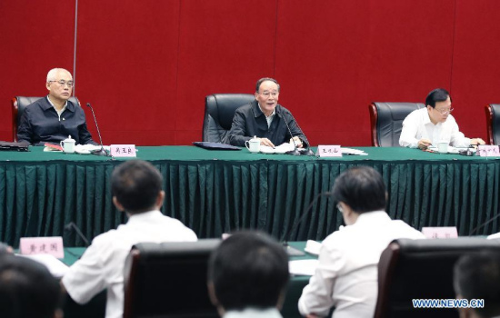 Wang Qishan (C, rear), a member of the Standing Committee of the Political Bureau of the Communist Party of China (CPC) Central Committee and secretary of the CPC Central Commission for Discipline Inspection (CCDI), presides over a symposium of local secretaries of the CPC Discipline Inspection in Jiaxing, east China's Zhejiang Province, May 9, 2015. Wang made an inspection tour in Zhejiang from May 8 to 10. (Xinhua/Yao Dawei) Wang Qishan (C, rear), a member of the Standing Committee of the Political Bureau of the Communist Party of China (CPC) Central Committee and secretary of the CPC Central Commission for Discipline Inspection (CCDI), presides over a symposium of local secretaries of the CPC Discipline Inspection in Jiaxing, east China's Zhejiang Province, May 9, 2015. Wang made an inspection tour in Zhejiang from May 8 to 10. (Xinhua/Yao Dawei)
