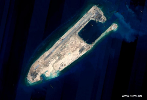 Satellite image shows the Yongshu reef of the Nansha Islands after a land reclamation project in south China. (Photo/Xinhua) Satellite image shows the Yongshu reef of the Nansha Islands after a land reclamation project in south China. (Photo/Xinhua)