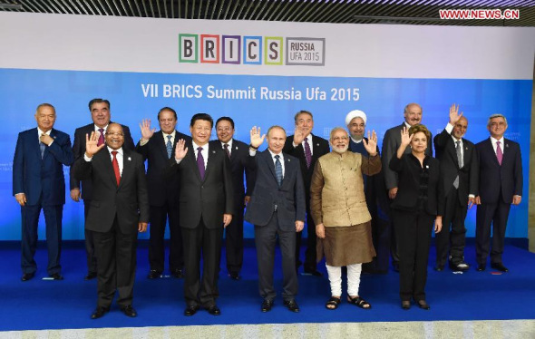 Chinese President Xi Jinping poses for photos with leaders of the Shanghai Cooperation Organization (SCO) members and observers, the Eurasian Economic Union (EEU) leaders, leaders of invited countries and the BRICS nations, namely Brazil, Russia, India, China and South Africa in Ufa, Russia, July 9, 2015. (Photo: Xinhua/Rao Aimin) Chinese President Xi Jinping poses for photos with leaders of the Shanghai Cooperation Organization (SCO) members and observers, the Eurasian Economic Union (EEU) leaders, leaders of invited countries and the BRICS nations, namely Brazil, Russia, India, China and South Africa in Ufa, Russia, July 9, 2015. (Photo: Xinhua/Rao Aimin)