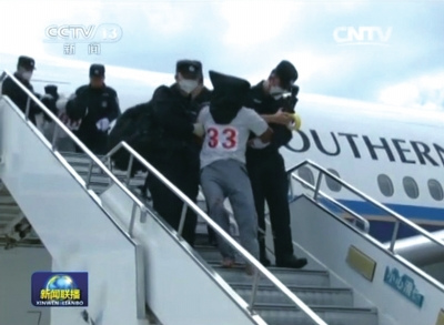 China defends Thailand's repatriation of illegal immigrants A screen grab from state broadcaster CCTV shows that illegal immigrants were repatriated from Thailand to China on Thursday. China defends Thailand's repatriation of illegal immigrants A screen grab from state broadcaster CCTV shows that illegal immigrants were repatriated from Thailand to China on Thursday.