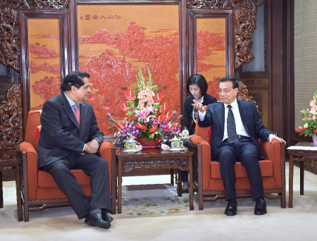 Chinese Premier Li Keqiang (R) meets with President of the New Development Bank (NDB) K.V. Kamath in Beijing, capital of China, July 23, 2015. The NDB opened in Shanghai on Tuesday to finance infrastructure projects, mainly in BRICS countries -- the emerging economies of Brazil, Russia, India, China and South Africa. (Photo: Xinhua/Li Tao) Chinese Premier Li Keqiang (R) meets with President of the New Development Bank (NDB) K.V. Kamath in Beijing, capital of China, July 23, 2015. The NDB opened in Shanghai on Tuesday to finance infrastructure projects, mainly in BRICS countries -- the emerging economies of Brazil, Russia, India, China and South Africa. (Photo: Xinhua/Li Tao)