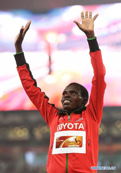 Silver medalist Kenya's Helah Kiprop celebrates during the awarding ceremony of the women's marathon event at the 2015 IAAF World Championships at the Bird's Nest National Stadium in Beijing, capital of China, Aug. 30, 2015. (Photo: Xinhua/Yue Yuewei) Silver medalist Kenya's Helah Kiprop celebrates during the awarding ceremony of the women's marathon event at the 2015 IAAF World Championships at the Bird's Nest National Stadium in Beijing, capital of China, Aug. 30, 2015. (Photo: Xinhua/Yue Yuewei)