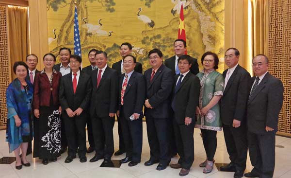 Chinese Consul General Li Qiangmin (front row, fourth from left) takes a photo with Chinese community leaders who were invited to observe the military parade in Beijing on Sept 13. PROVIDED TO CHINA DAILY Chinese Consul General Li Qiangmin (front row, fourth from left) takes a photo with Chinese community leaders who were invited to observe the military parade in Beijing on Sept 13. PROVIDED TO CHINA DAILY
