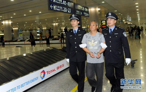 Zhao Ruheng, a Chinese corruption suspect who has been at large for three years, has been repatriated from Ghana to China, Nov. 1, 2015. (Photo/Xinhua) Zhao Ruheng, a Chinese corruption suspect who has been at large for three years, has been repatriated from Ghana to China, Nov. 1, 2015. (Photo/Xinhua)