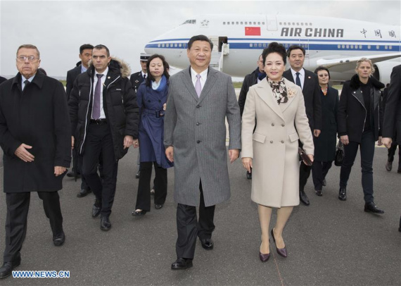 Chinese President Xi Jinping, accompanied by his wife Peng Liyuan, arrives in Paris, capital of France, to attend the opening ceremony of an international conference on climate change, Nov. 29, 2015. (Xinhua/Huang Jingwen) Chinese President Xi Jinping, accompanied by his wife Peng Liyuan, arrives in Paris, capital of France, to attend the opening ceremony of an international conference on climate change, Nov. 29, 2015. (Xinhua/Huang Jingwen)