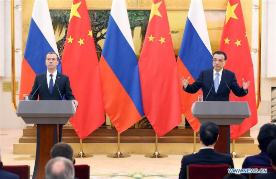 Chinese Premier Li Keqiang (R) and Russian Prime Minister Dmitry Medvedev meet the press after the 20th China-Russia Prime Ministers' Regular Meeting in Beijing, capital of China, Dec. 17, 2015. (Photo: Xinhua/Yao Dawei) Chinese Premier Li Keqiang (R) and Russian Prime Minister Dmitry Medvedev meet the press after the 20th China-Russia Prime Ministers' Regular Meeting in Beijing, capital of China, Dec. 17, 2015. (Photo: Xinhua/Yao Dawei)