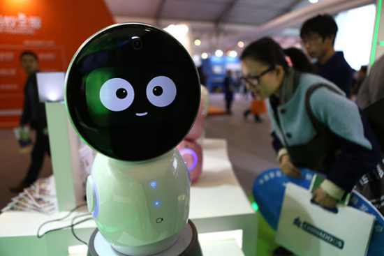 Robot Xiaoyi, which can sing, tell a story and chat with people, is on display at the Light of the Internet Expo in Wuzhen, Zhejiang province, Dec 14, 2015. (Photo: China Daily/Zou Hong) Robot Xiaoyi, which can sing, tell a story and chat with people, is on display at the Light of the Internet Expo in Wuzhen, Zhejiang province, Dec 14, 2015. (Photo: China Daily/Zou Hong)