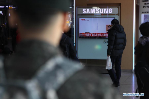 South Korean citizens watch a TV news program with a file footage about the Democratic People's Republic of Korea (DPRK) long-range missile launch, at Seoul Railway Station in Seoul, South Korea, Feb.7, 2016. (Photo: Xinhua/Seongbin Kang) South Korean citizens watch a TV news program with a file footage about the Democratic People's Republic of Korea (DPRK) long-range missile launch, at Seoul Railway Station in Seoul, South Korea, Feb.7, 2016. (Photo: Xinhua/Seongbin Kang)