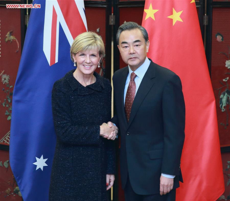 Chinese Foreign Minister Wang Yi (R) shakes hands with his Australian counterpart Julie Bishop in Beijing, capital of China, Feb. 17, 2016. Wang and Bishop attended the third round of bilateral diplomatic and strategic dialogue in Beijing on Wednesday. (Photo: Xinhua/Ding Haitao) Chinese Foreign Minister Wang Yi (R) shakes hands with his Australian counterpart Julie Bishop in Beijing, capital of China, Feb. 17, 2016. Wang and Bishop attended the third round of bilateral diplomatic and strategic dialogue in Beijing on Wednesday. (Photo: Xinhua/Ding Haitao)