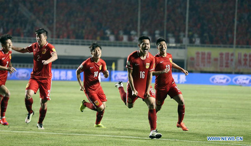 China's Huang Bowen (2nd R) celebrates with teammates after scoring against Qatar during the Group C Round 2 match of 2018 FIFA World Cup Russia and AFC Asian Cup UAE 2019 Preliminary Joint Qualification in Xi'an, capital of northwest China's Shaanxi province, March 29, 2016. China won the match 2-0. (Photo: Xinhua/Cao Can) China's Huang Bowen (2nd R) celebrates with teammates after scoring against Qatar during the Group C Round 2 match of 2018 FIFA World Cup Russia and AFC Asian Cup UAE 2019 Preliminary Joint Qualification in Xi'an, capital of northwest China's Shaanxi province, March 29, 2016. China won the match 2-0. (Photo: Xinhua/Cao Can)