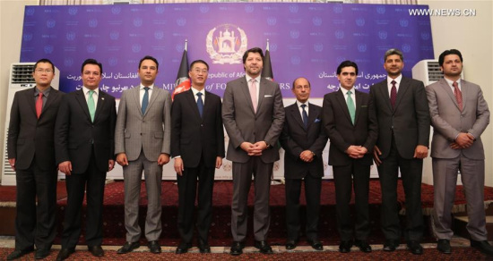 Afghan deputy foreign minister Hekmat Karzai (5th R) and Chinese Ambassador to Afghanistan Yao Jing (4th L) pose for photos during One Belt one Road seminar in Kabul, capital of Afghanistan, May 8, 2016. One Belt One Road seminar, jointly organized by Afghan foreign ministry and Chinese Embassy in Afghanistan, kicked off on Sunday, discussing the opportunity of boosting connectivity and development along the ancient trade route. (Photo: Xinhua/Rahmat Alizadah) Afghan deputy foreign minister Hekmat Karzai (5th R) and Chinese Ambassador to Afghanistan Yao Jing (4th L) pose for photos during One Belt one Road seminar in Kabul, capital of Afghanistan, May 8, 2016. One Belt One Road seminar, jointly organized by Afghan foreign ministry and Chinese Embassy in Afghanistan, kicked off on Sunday, discussing the opportunity of boosting connectivity and development along the ancient trade route. (Photo: Xinhua/Rahmat Alizadah)
