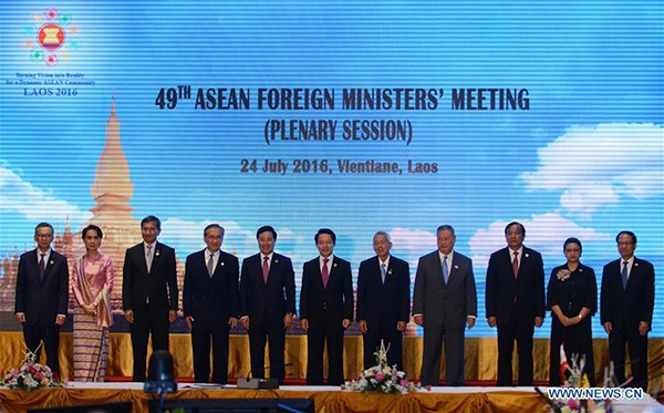 Participants pose for a group photo before the ASEAN Foreign Ministers Meeting in Vientiane, capital of Laos, on July 24, 2016. The 49th ASEAN Foreign Ministers Meeting kicked off here on Sunday. (Photo/Xinhua) Participants pose for a group photo before the ASEAN Foreign Ministers Meeting in Vientiane, capital of Laos, on July 24, 2016. The 49th ASEAN Foreign Ministers Meeting kicked off here on Sunday. (Photo/Xinhua)
