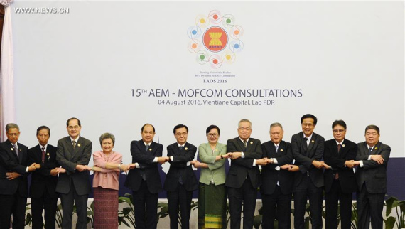 Delegates pose for a group photo during the 15th China-ASEAN (10+1) economic ministers' meeting in Vientiane, Laos, on Aug. 4, 2016. Chinese Minister of Commerce Gao Hucheng attended the meeting. (Xinhua/Liu Ailun) Delegates pose for a group photo during the 15th China-ASEAN (10+1) economic ministers' meeting in Vientiane, Laos, on Aug. 4, 2016. Chinese Minister of Commerce Gao Hucheng attended the meeting. (Xinhua/Liu Ailun)