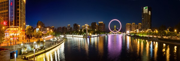 A night view of the Haihe River at the Tianjin Eye (center). (Photo by Li Hailiang/provided to chinadaily.com.cn) A night view of the Haihe River at the Tianjin Eye (center). (Photo by Li Hailiang/provided to chinadaily.com.cn)