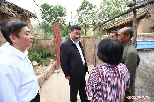 Chinese President Xi Jinping (C) visits the poverty-stricken family of Cao Liuren (1st R) in Zhaojiawa Village of Kelan County in Xinzhou City, north China's Shanxi Province, June 21, 2017. Xi had an inspection tour in Shanxi Wednesday. (Xinhua/Li Xueren) Chinese President Xi Jinping (C) visits the poverty-stricken family of Cao Liuren (1st R) in Zhaojiawa Village of Kelan County in Xinzhou City, north China's Shanxi Province, June 21, 2017. Xi had an inspection tour in Shanxi Wednesday. (Xinhua/Li Xueren)