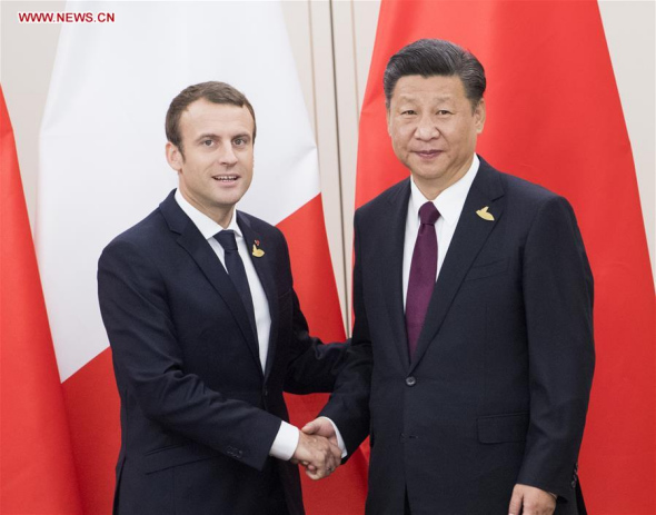 Chinese President Xi Jinping (R) meets with his French counterpart Emmanuel Macron in Hamburg, Germany, July 8, 2017. (Xinhua/Li Xueren) Chinese President Xi Jinping (R) meets with his French counterpart Emmanuel Macron in Hamburg, Germany, July 8, 2017. (Xinhua/Li Xueren)