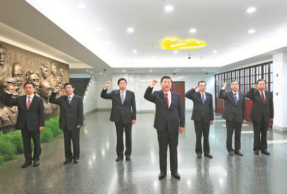 Xi Jinping, general secretary of the Communist Party of China Central Committee,leads the other six members of the Standing Committee of the Political Bureau of the CPC Central Committee in reciting the admission oath as they face the Party flag on Tuesday, during their visit to the memorial hall of the first CPC National Congress in Shanghai.(Photo: Xinhua/Lan Hongguang) Xi Jinping, general secretary of the Communist Party of China Central Committee,leads the other six members of the Standing Committee of the Political Bureau of the CPC Central Committee in reciting the admission oath as they face the Party flag on Tuesday, during their visit to the memorial hall of the first CPC National Congress in Shanghai.(Photo: Xinhua/Lan Hongguang)