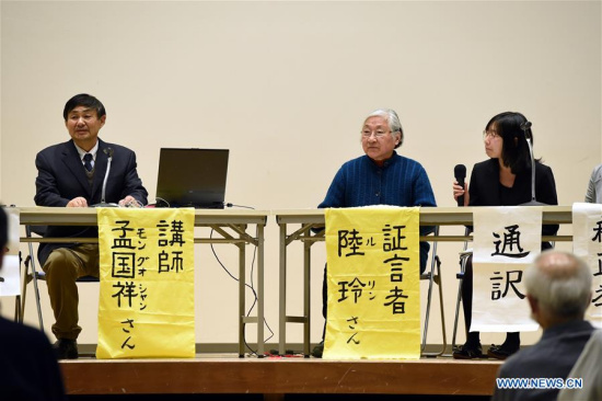 Lu Ling (2nd R), daughter of a Nanjing Massacre survivor who passed away in 2004, shares her mother's story with Japanese residents at a testimony meeting in Shizuoka city, central Japan, on Dec. 12, 2017. Lu's mother Li Xiuying, born in 1919, was stabbed 37 times by Japanese soldiers and lost her baby in the massacre. Some 200 Japanese people attended a testimony meeting on Tuesday in Shizuoka city in commemoration of the 1937 Nanjing Massacre. (Xinhua/Ma Ping) Lu Ling (2nd R), daughter of a Nanjing Massacre survivor who passed away in 2004, shares her mother's story with Japanese residents at a testimony meeting in Shizuoka city, central Japan, on Dec. 12, 2017. Lu's mother Li Xiuying, born in 1919, was stabbed 37 times by Japanese soldiers and lost her baby in the massacre. Some 200 Japanese people attended a testimony meeting on Tuesday in Shizuoka city in commemoration of the 1937 Nanjing Massacre. (Xinhua/Ma Ping)