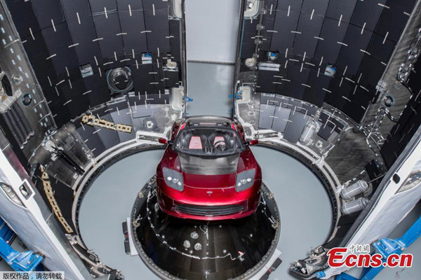 A red Tesla Roadster is seen during preparations to use it as a mock payload for the launch of a SpaceX Falcon Heavy rocket, in Cape Canaveral, Florida, U.S. December 6, 2017. (Photo/Agencies) A red Tesla Roadster is seen during preparations to use it as a mock payload for the launch of a SpaceX Falcon Heavy rocket, in Cape Canaveral, Florida, U.S. December 6, 2017. (Photo/Agencies)