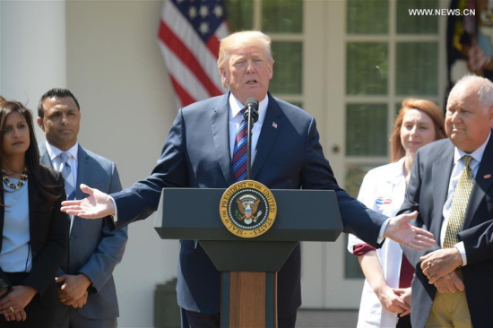 U.S. President Donald Trump (C) delivers a speech at the White House, the United States, on April 12, 2018. U.S. President Donald Trump said on Thursday that he was going to hold meeting on Syria and the decisions on the U.S. response to the suspected chemical weapons attack in Syria will be made fairly soon. (Xinhua/Yang Chenglin) U.S. President Donald Trump (C) delivers a speech at the White House, the United States, on April 12, 2018. U.S. President Donald Trump said on Thursday that he was going to hold meeting on Syria and the decisions on the U.S. response to the suspected chemical weapons attack in Syria will be made fairly soon. (Xinhua/Yang Chenglin)
