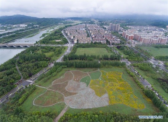 Aerial photo taken by drone shows the new Beichuan county, Southwest China's Sichuan province, May 10, 2018. Beichuan was one of the worst-hit areas when a catastrophic earthquake struck Sichuan's Wenchuan county on May 12, 2008. Beichuan county later was rebuilt in a new location. Now about 35,000 people live in the new county. (Photo/Xinhua) Aerial photo taken by drone shows the new Beichuan county, Southwest China's Sichuan province, May 10, 2018. Beichuan was one of the worst-hit areas when a catastrophic earthquake struck Sichuan's Wenchuan county on May 12, 2008. Beichuan county later was rebuilt in a new location. Now about 35,000 people live in the new county. (Photo/Xinhua)