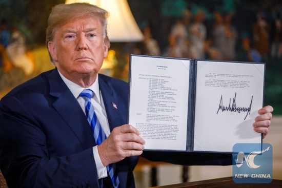 U.S. President Donald Trump displays a signed presidential memorandum at the White House in Washington D.C., the United States, on May 8, 2018. U.S. President Donald Trump said that the United States will withdraw from the Iran nuclear deal, a landmark agreement signed in 2015. (Xinhua/Ting Shen) U.S. President Donald Trump displays a signed presidential memorandum at the White House in Washington D.C., the United States, on May 8, 2018. U.S. President Donald Trump said that the United States will withdraw from the Iran nuclear deal, a landmark agreement signed in 2015. (Xinhua/Ting Shen)