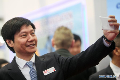 China's Xiaomi Tech's CEO Lei Jun takes a selfie with his cellphone at 2015 CeBIT Technology Trade fair in Hanover, Germany, on March 16, 2015. (Xinhua/Zhang Fan) China's Xiaomi Tech's CEO Lei Jun takes a selfie with his cellphone at 2015 CeBIT Technology Trade fair in Hanover, Germany, on March 16, 2015. (Xinhua/Zhang Fan)