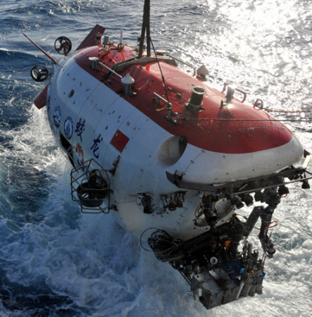 China's deep-sea manned submersible Jiaolong is lifted out of water after an exploration mission, in the southwest Indian Ocean, Jan 10, 2015. (Photo/Xinhua) China's deep-sea manned submersible Jiaolong is lifted out of water after an exploration mission, in the southwest Indian Ocean, Jan 10, 2015. (Photo/Xinhua)