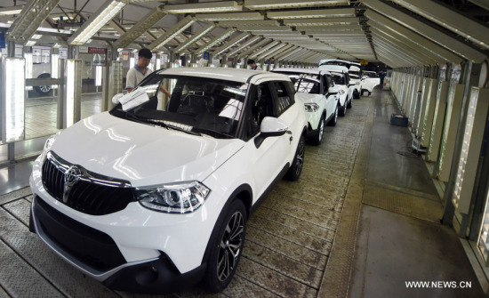 Workers examine cars at the general assembly shop of Zhonghua cars of Huachen Auto Group in Shenyang, capital of northeast China's Liaoning Province, June 10, 2015. (Photo: Xinhua/Yang Qing) Workers examine cars at the general assembly shop of Zhonghua cars of Huachen Auto Group in Shenyang, capital of northeast China's Liaoning Province, June 10, 2015. (Photo: Xinhua/Yang Qing)