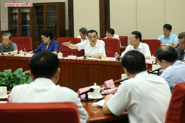 Chinese Premier Li Keqiang (C) presides over a State Council workshop on the impact the international economic and financial situation has on China's economy in Beijing, capital of China, Aug. 28, 2015. Chinese Vice Premier Zhang Gaoli also attended the workshop Friday. (Xinhua/Ma Zhancheng) Chinese Premier Li Keqiang (C) presides over a State Council workshop on the impact the international economic and financial situation has on China's economy in Beijing, capital of China, Aug. 28, 2015. Chinese Vice Premier Zhang Gaoli also attended the workshop Friday. (Xinhua/Ma Zhancheng)
