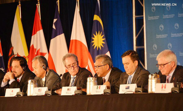 Trade ministers of the United States and 11 other Pacific Rim countries attend a press conference after negotiating the Trans-Pacific Partnership (TPP) trade agreement in Atlanta, the United States, on Oct. 5, 2015. Trade ministers of the United States and 11 other Pacific Rim countries have successfully concluded the Trans-Pacific Partnership (TPP) free trade talks, U.S. Trade Representative Michael Froman said Monday. (Photo/Xinhua) Trade ministers of the United States and 11 other Pacific Rim countries attend a press conference after negotiating the Trans-Pacific Partnership (TPP) trade agreement in Atlanta, the United States, on Oct. 5, 2015. Trade ministers of the United States and 11 other Pacific Rim countries have successfully concluded the Trans-Pacific Partnership (TPP) free trade talks, U.S. Trade Representative Michael Froman said Monday. (Photo/Xinhua)