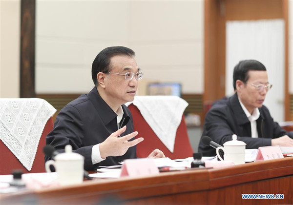 Chinese Premier Li Keqiang (L) presides over a symposium of the State Council to discuss key work for this year in Beijing, capital of China, Jan. 20, 2016. Chinese Vice Premier Zhang Gaoli also attended the symposium. (Xinhua/Ding Lin) Chinese Premier Li Keqiang (L) presides over a symposium of the State Council to discuss key work for this year in Beijing, capital of China, Jan. 20, 2016. Chinese Vice Premier Zhang Gaoli also attended the symposium. (Xinhua/Ding Lin)