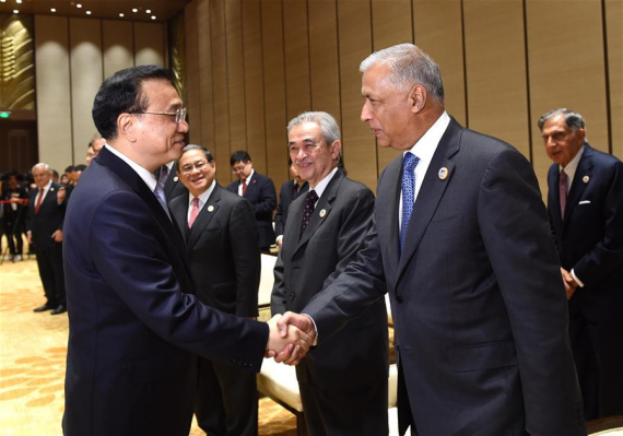 Chinese Premier Li Keqiang (L) meets with members of the Boao Forum for Asia (BFA) board of directors in Boao, south China's Hainan Province, March 24, 2016. (Photo: Xinhua/Rao Aimin) Chinese Premier Li Keqiang (L) meets with members of the Boao Forum for Asia (BFA) board of directors in Boao, south China's Hainan Province, March 24, 2016. (Photo: Xinhua/Rao Aimin)