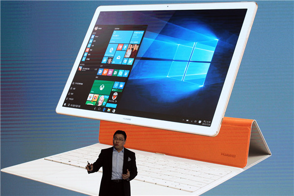 Wan Biao, president of Huawei Technologies Corp's mobile broadband and family products division, introduces the company's latest product - the Huawei Matebook, which retails from 4,988 yuan ($760.67), in Beijing on May 26, 2016.(Photo by Zhang Wei/China Daily) Wan Biao, president of Huawei Technologies Corp's mobile broadband and family products division, introduces the company's latest product - the Huawei Matebook, which retails from 4,988 yuan ($760.67), in Beijing on May 26, 2016.(Photo by Zhang Wei/China Daily)
