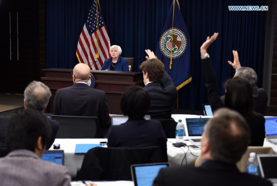 U.S. Federal Reserve Chair Janet Yellen (Rear) attends a news conference in Washington D.C., capital of the United States, on March 15, 2017. (Xinhua/Yin Bogu)