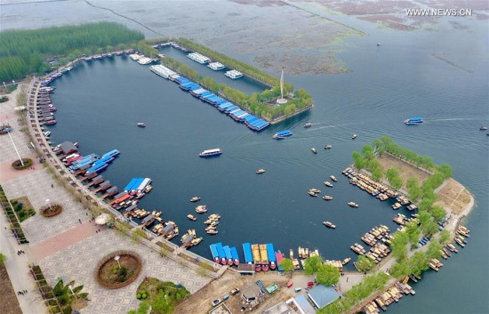 Photo taken on April 9, 2017 shows a dock in Baiyangdian, one of the largest freshwater wetlands in north China, in Anxin County, north China's Hebei Province. China announced the plan for Xiongan New Area officially on April 1, 2017. The new area will span Xiongxian, Rongcheng and Anxin counties in Hebei Province, eventually covering 2,000 square kilometers. (Xinhua/Mou Yu) Photo taken on April 9, 2017 shows a dock in Baiyangdian, one of the largest freshwater wetlands in north China, in Anxin County, north China's Hebei Province. China announced the plan for Xiongan New Area officially on April 1, 2017. The new area will span Xiongxian, Rongcheng and Anxin counties in Hebei Province, eventually covering 2,000 square kilometers. (Xinhua/Mou Yu)