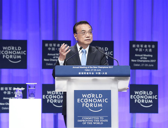 Chinese Premier Li Keqiang addresses the opening ceremony of the Annual Meeting of the New Champions 2017, or Summer Davos, in the city of Dalian, northeast China's Liaoning Province, June 27, 2017. (Xinhua/Pang Xinglei) Chinese Premier Li Keqiang addresses the opening ceremony of the Annual Meeting of the New Champions 2017, or Summer Davos, in the city of Dalian, northeast China's Liaoning Province, June 27, 2017. (Xinhua/Pang Xinglei)