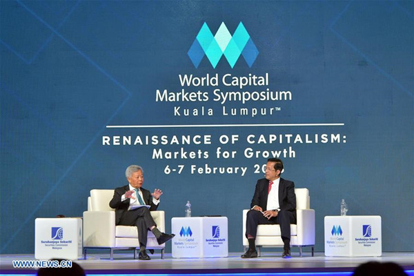 President of the Asian Infrastructure Investment Bank (AIIB) Jin Liqun (L) speaks at the World Capital Market Symposium in Kuala Lumpur, Malaysia, Feb. 6, 2018. The Asian Infrastructure Investment Bank (AIIB) will work with Malaysia, one of the founding members, to seek ways to support infrastructure development in the ASEAN region, said the bank's president Jin Liqun on Tuesday. (Xinhua/Chong Voon Chung) President of the Asian Infrastructure Investment Bank (AIIB) Jin Liqun (L) speaks at the World Capital Market Symposium in Kuala Lumpur, Malaysia, Feb. 6, 2018. The Asian Infrastructure Investment Bank (AIIB) will work with Malaysia, one of the founding members, to seek ways to support infrastructure development in the ASEAN region, said the bank's president Jin Liqun on Tuesday. (Xinhua/Chong Voon Chung)