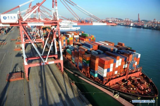 A freighter anchors at a dock in Qingdao, East China's Shandong province, Jan 12, 2018. (Photo/Xinhua) A freighter anchors at a dock in Qingdao, East China's Shandong province, Jan 12, 2018. (Photo/Xinhua)