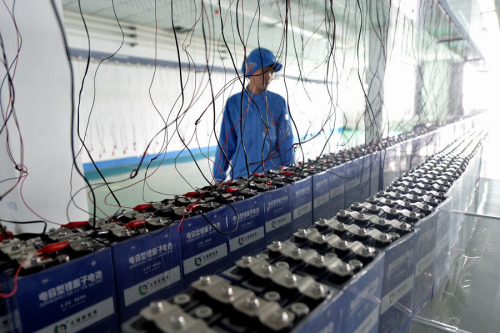 A worker checks facilities at a battery production line in Liaoning Province. (Photo/Xinhua) A worker checks facilities at a battery production line in Liaoning Province. (Photo/Xinhua)
