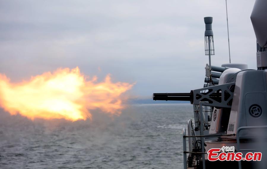 A Chinese warship conducts gun firing exercises during a drill with Russia in the Baltic Sea. The aim of the Joint Sea 2017 drills, which kicked off on Saturday and will last until July 28, is to carry out joint rescue missions and ensure maritime economic activities. The ships, which were divided into two tactical groups, fired their secondary guns at floating targets set by the Russian side. (Photo: China News Service/Wang Xiujun)