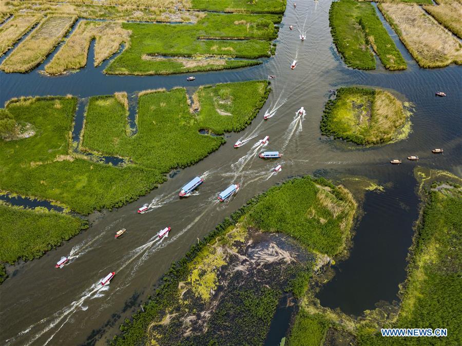 Tourists visit Baiyangdian lake in Xiongan New Area(1/7)
