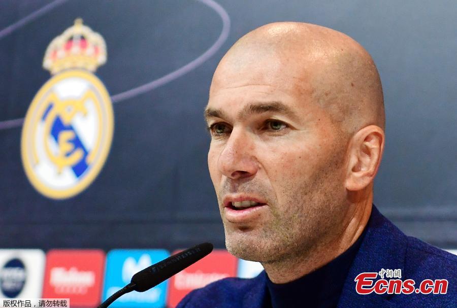 Real Madrid coach Zinedine Zidane speaks at a press conference, May 31, 2018. The 45-year-old former international announced to step down as Real Madrid coach on Thursday, saying that it was time for a change for himself and the club. \