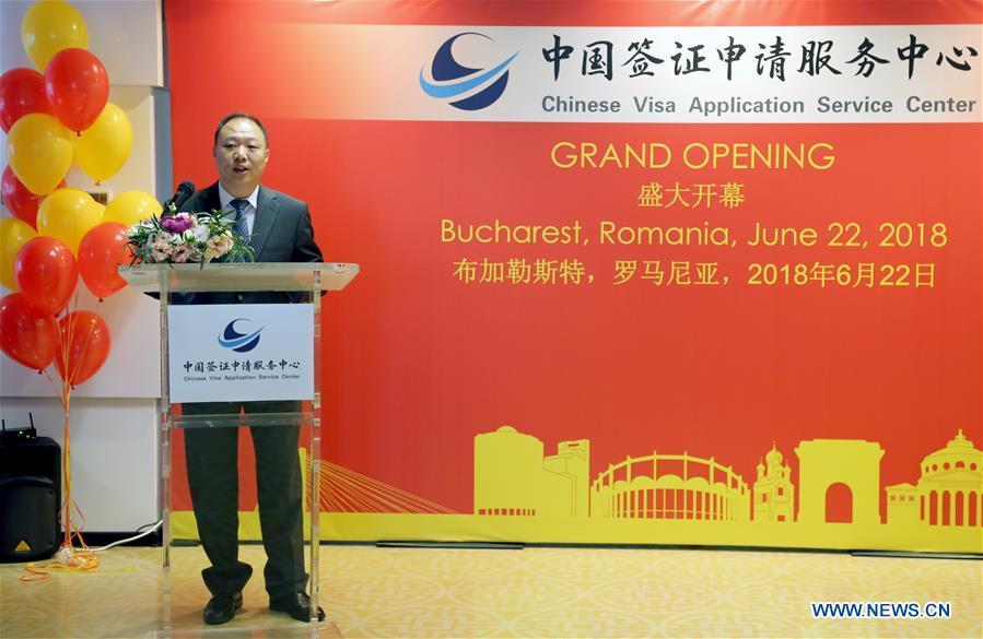 Minister Counsellor Tu Jiang, charge d\'affaires a.i. of the Chinese Embassy in Romania, addresses an opening ceremony of a Chinese visa application service center in Bucharest, capital of Romania, on June 22, 2018. China opened here on Friday a visa application service center, the first in Central and Eastern Europe (CEE), to facilitate the visa processing and provide better service to Romanian applicants wishing to visit China. (Xinhua/Chen Jin)