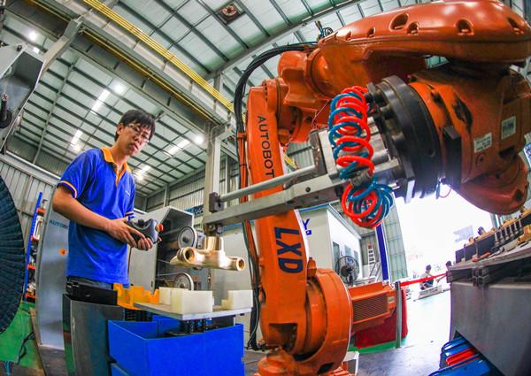 Foshan
A worker assembles a robotic arm at a factory in Foshan, South China\'s Guangdong Province. (Provided to China Daily)
