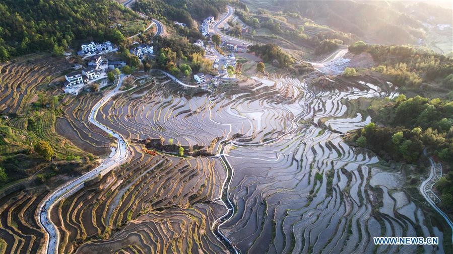 Aerial photo taken on April 10, 2018 shows the bird\'s-eye view of terraced fields on the Wuyun Mountain in Qichun County of central China\'s Hubei Province. Comprehensive progress has been made since the report delivered at the 18th National Congress of the Communist Party of China (CPC) in 2012 included ecological development as a major task in the country\'s overall plan and proposed building a \