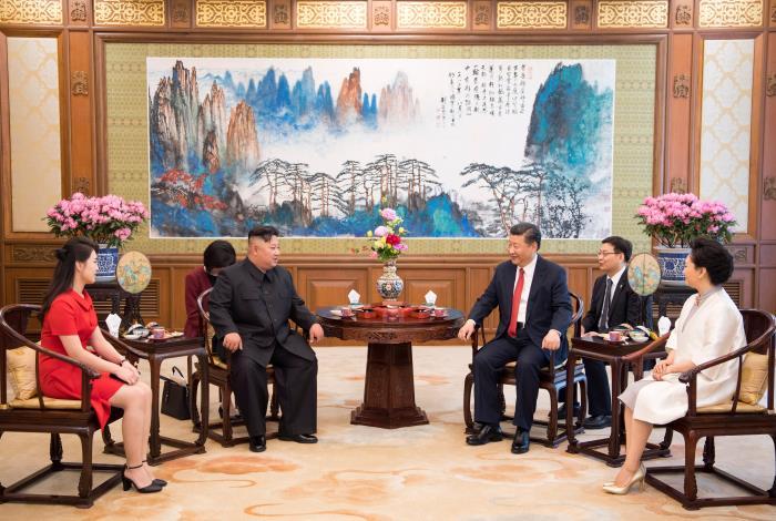 June 20, 2018
President Xi Jinping drinks tea with Kim Jong-un, top leader of the Democratic People’s Republic of Korea, at the Diaoyutai State Guesthouse in Beijing, following the easing of tensions surrounding the nuclear issue in the Korean Peninsula. This cup of tea is a great representation of the concept of peace. (Photo/Xinhua)