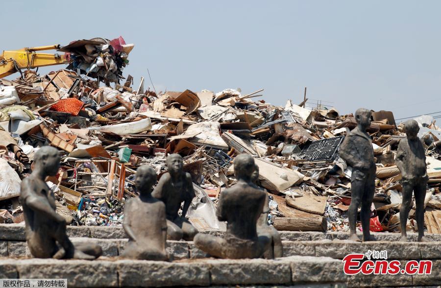 Household waste, caused by a flooding, are piled up at a temporary waste-collection point in Kurashiki, Okayama Prefecture, Japan, July 14, 2018. (Photo/Agencies)