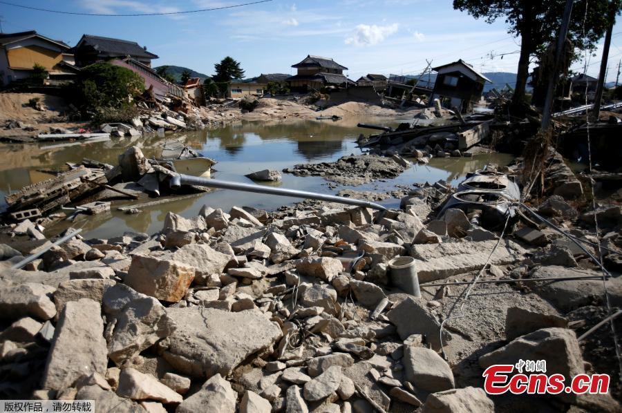 Submerged and destroyed houses are seen near the site where river banks were broken along Suemasa river in Mabi town in Kurashiki, Okayama Prefecture, Japan, July 9, 2018.(Photo/Agencies)